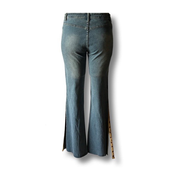 Bebe Flare Jeans with faux suede studded trim lines on the outer leg, Raw hem - Picture 3 of 11
